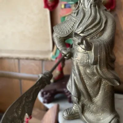 Sale Photo Thumbnail #19: Metal figurine depicting Guan Yu holding a guandao, featuring detailed armor and dragon patterns on the robe.