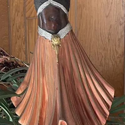 Sale Photo Thumbnail #25: Art Deco style bronze statue of an Egyptian dancer with polychrome accents, signed by the artist on the pedestal base.