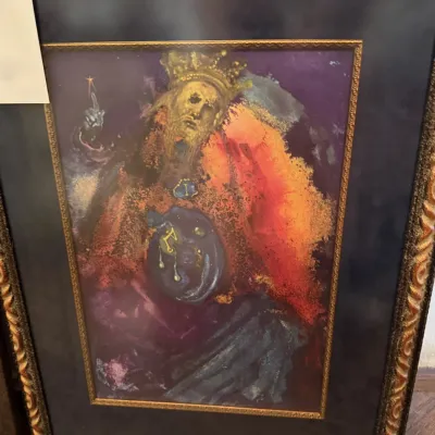 Sale Photo Thumbnail #207: Framed Salvador Dalí art print depicting King Solomon, presented in a dark mat and an ornate gilt frame.