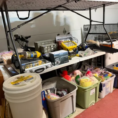 Sale Photo Thumbnail #344: Collection of workshop equipment, power tools, small parts organizers, and crafting supplies stored in plastic totes