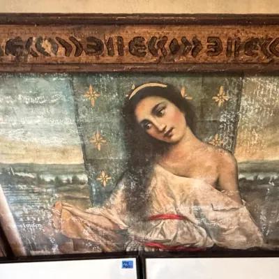 Sale Photo Thumbnail #234: Classical-style portrait painting of a woman by artist Richard Franklin, framed in a heavy carved wooden frame with distressing and geometric detailing.