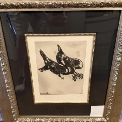 Sale Photo Thumbnail #209: Framed Marc Chagall etching featuring birds, double-matted with a beaded inner border and an ornate metallic-finish frame.